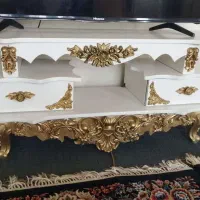 میز تلویزیون و اینه شمعدان