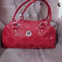 کیف مجلسی جنس ورنی رنگ زرشکی مارک LV