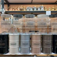 قوطی آریسام ، ظرف نگهدارنده