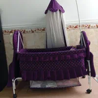 گهواره در حد نو به همراه روروک و ساک هدیه