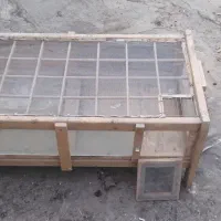 قفس چوبی شیشه ای