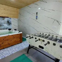 کلبه سوئیسی با جکوزی بزرگ ۶نفره|اجارهٔ کوتاه‌مدت ویلا و باغ|بندر انزلی, طالب آباد|دیوار