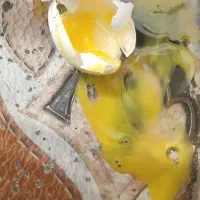 رفع چشم ونظر با شکستن تخم سرکتاب