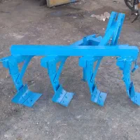 خیش با تراکتور باغ