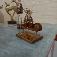 مجسمه چوبی یار