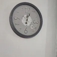 ساعت و شال پرده