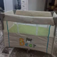 گهواره کنار تخت مادر