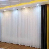 دوخت وتعمیرات پرده