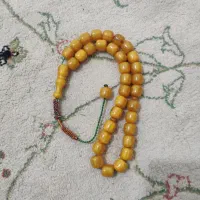 تسبیح کهربا رگه دار