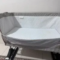 تخت نوزادی کنار مادر