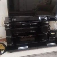 میز تلوزیون شیشه ای دو کشو
