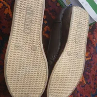 کفش زنانه|کیف، کفش، کمربند|رشت, فلسطین|دیوار