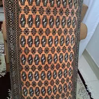۲عددپشتی قرمز.۲تیکه موکت ۱.۵در ۳متر