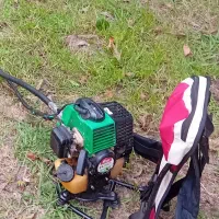 زدن علف های هرز و چمن زنی