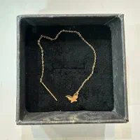 گوشواره طلا ۱۵۰ تومان بالای تابلو
