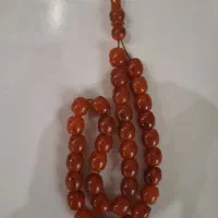 تسبیح کهربا۳۵ دانه رگه دار کهنه اصل آلمان