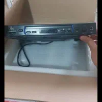 دی وی دی به همراه دو عدد مینی باند