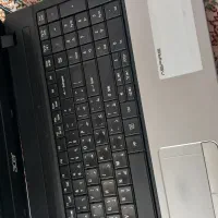 یک دستگاه لپ تاپ و فاکس