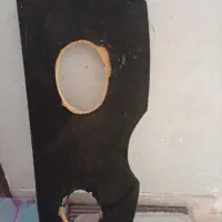 طاقچه صندوق عقب و تعدادی لاستیک و قطعات ماشین