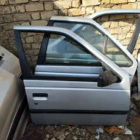 درب پژو رنگ نقره‌ای و نوک مدای