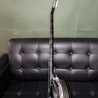 جمبوش دسته باغلاما|سازهای سنتی|یزد, |دیوار