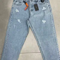 جین تک و عمده|لباس|تهران, فلسطین (میدان انقلاب)|دیوار