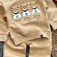 اتو کار ماهر لباس  بچه گانه . بسته بند لباس