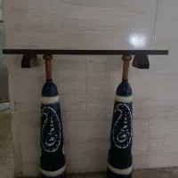میل باستانی و تخته شنا