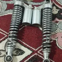 کمک عقب موتور سیکلت