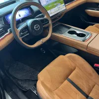 مزدا EZ6 داخل چرم شتری لاکچری
