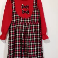 ۱ یک پیراهن دختراند در حد نو