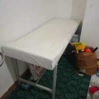 تخت و پرده برای اپیلاسیون و تزریقات