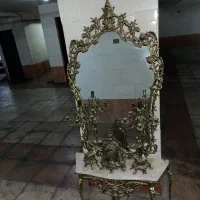 خریدار و فروشنده کنسول برنجی