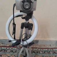دوربین عکاسی کانون وپایه ومهتابی