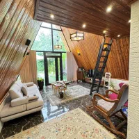 کلبه سویسی تک خواب زرین|اجارهٔ کوتاهمدت ویلا و باغ|رویان, |دیوار