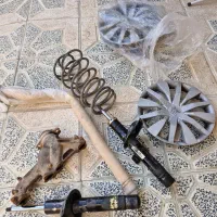کمک فنر پژو۲۰۶ فابریک منیفولد۴۰۵ قالپاق اسپرت پژو