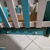 تخت گهواره ای همراه با  صندلی غذا  تاپ موزیکال