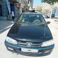 پژو پارس مشکی عروسک داشبورد جدید