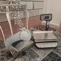 کالباس بر براکس و ترازو محک