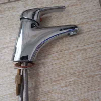 شیر آب و حوله خشک کن