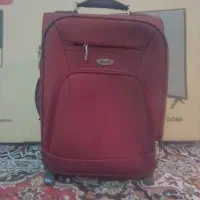 یک عدد. چمدان مسافرتی
