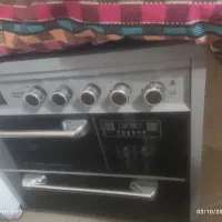 جارو برقی اجاق گاز شیشه آیی طرح فر