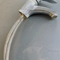 شیر روشویی سالم به همراه شلنگ ها