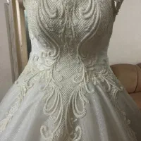 لباس تن نخورده از مزون هستی