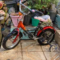 دوچرخه سایز ۱۲ لاستیک نو با کمکی