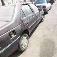 یک دستگاه خودروپژو2000 بدون رنگ کاملا سالم