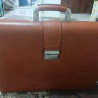 کیف چرم نو نو با کاورو جعبه