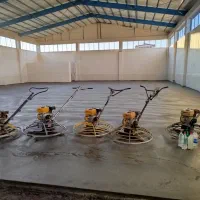 اجرای بتن ریزی کف با ماله پروانه