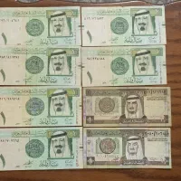 اسکناس های قدیمی و تا نخورده به تعداد داخل عکس