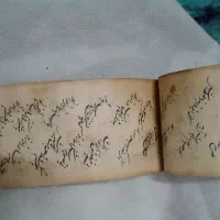 قرآن خطی دست نویس قدیمی|کلکسیون اشیاء عتیقه|کازرون, |دیوار